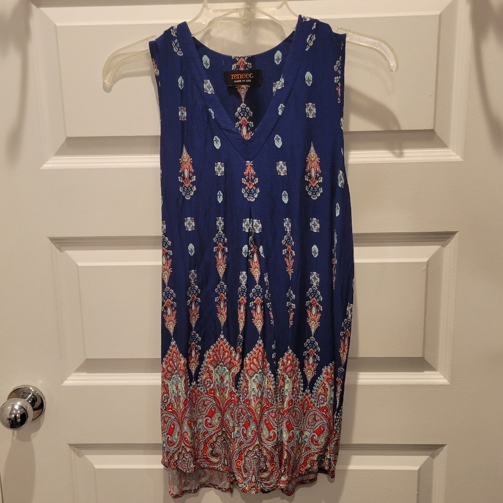 Renee C. Maternity top. Loose fit. Blue background with pattern. Size small.